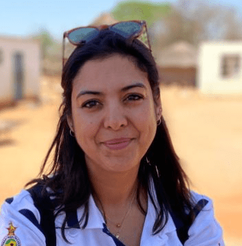 photo of Islay Mactagaart in front of a desert background