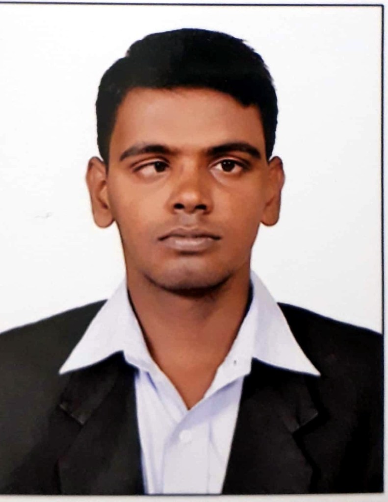 head shot of Gokul S wearing business attire in front of a white background 