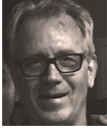 head shot of Moish Tov. The photo is in black and white