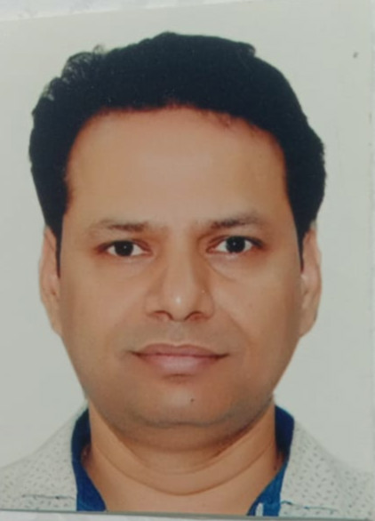head shot of Vinayak Tripathi who has short black hair